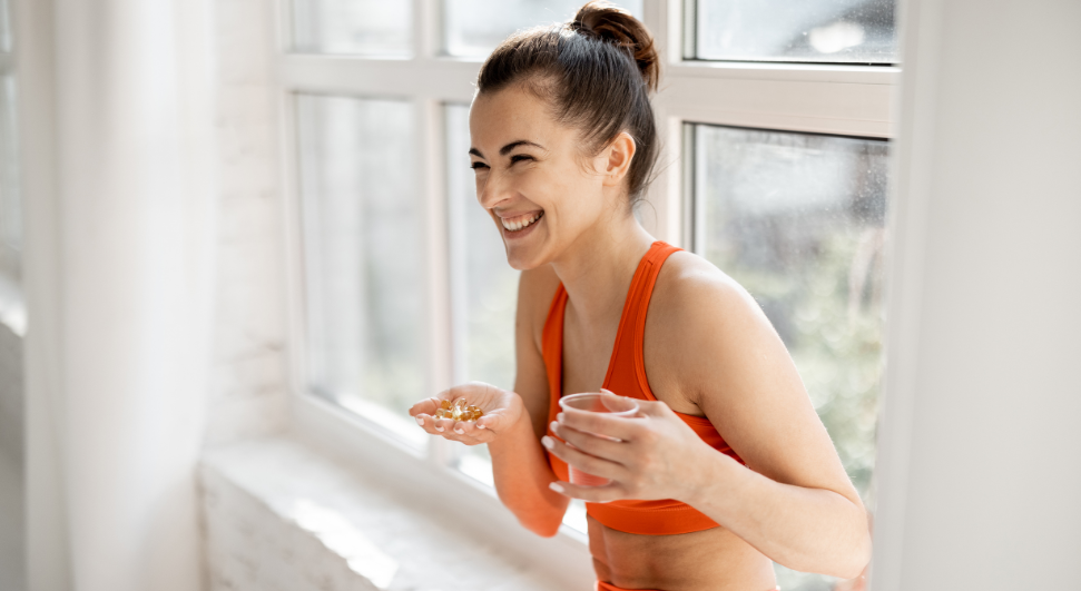 A woman taking a NSF certified for sport supplement